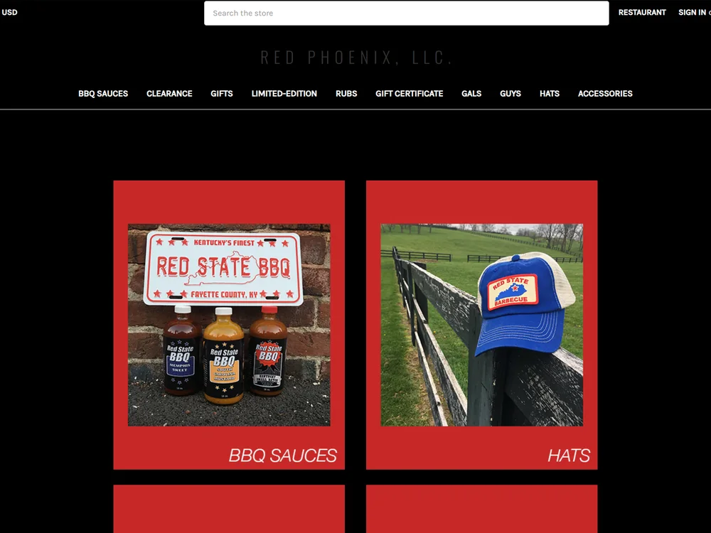 The old Red State BBQ home page: a black layout headed Red Phoenix, LLC, with red category tiles for BBQ Sauces and Hats.